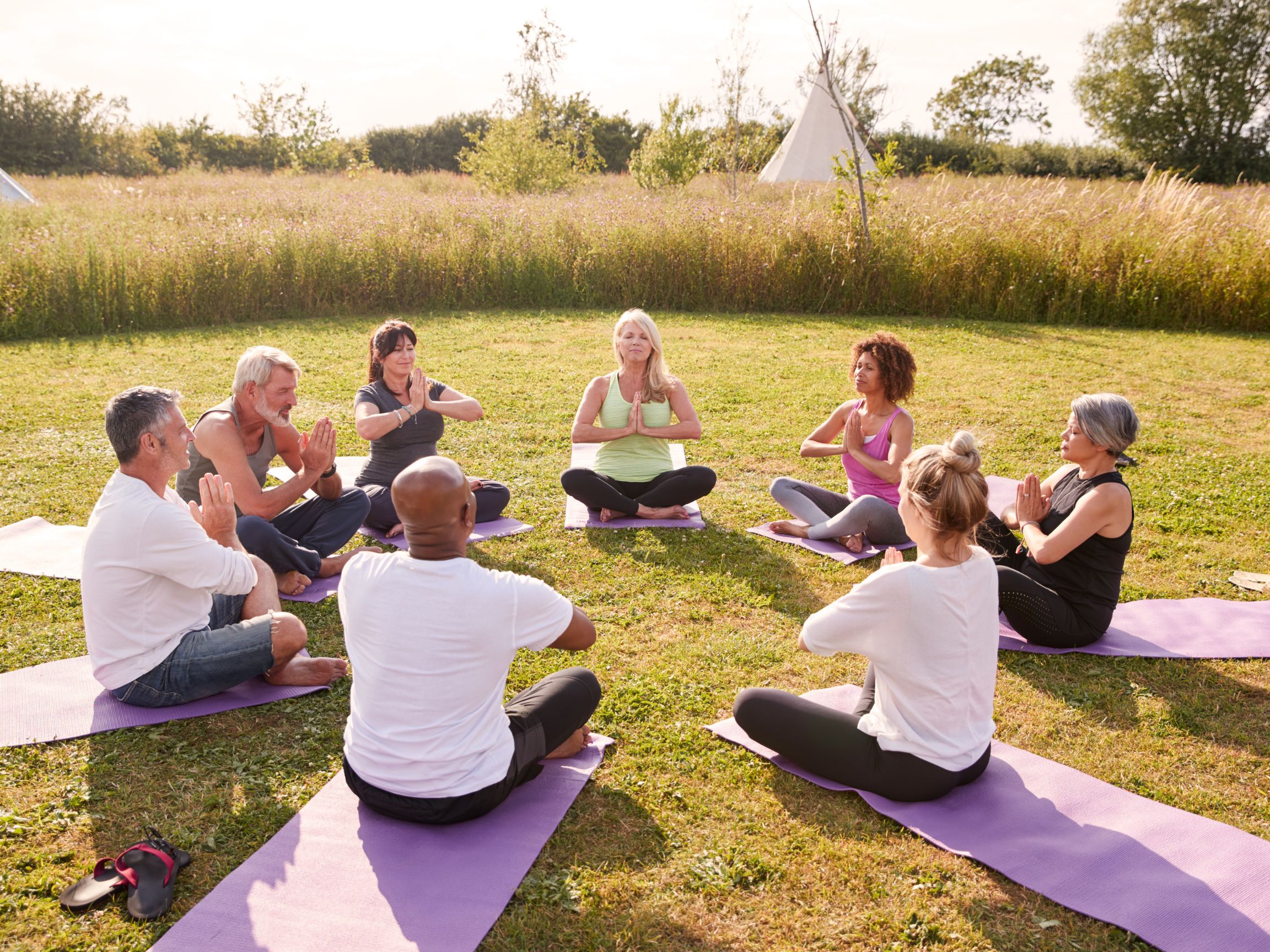 People Meditating in a Grou